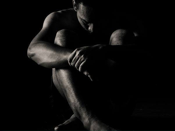 Man sitting in the dark