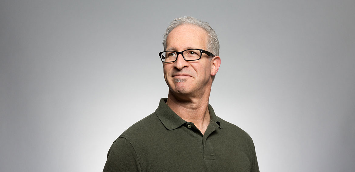 Mature man in a green polo
