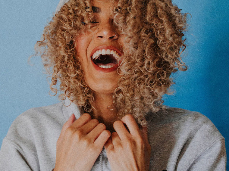 A woman with curly hair
