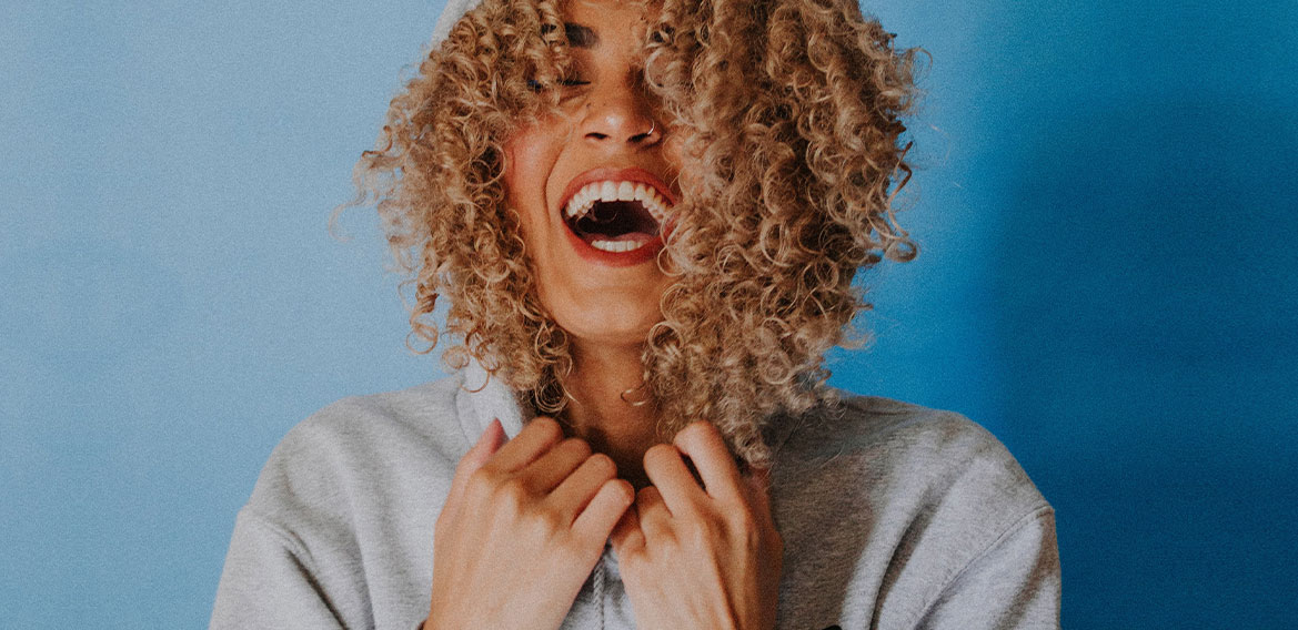 A woman with curly hair