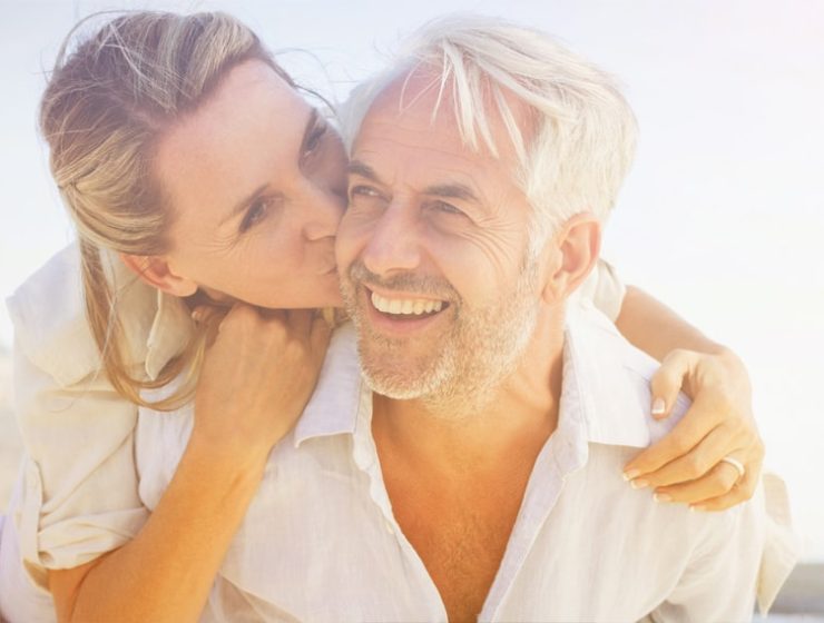 Older couple kissing