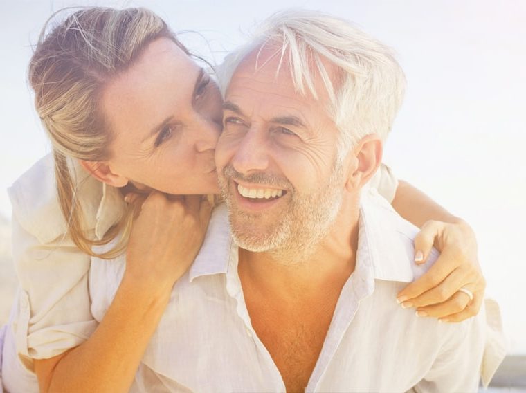 Older couple kissing