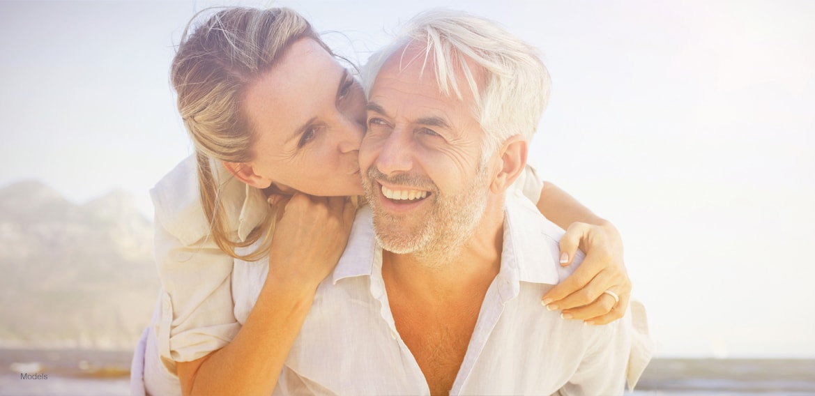 Older couple kissing