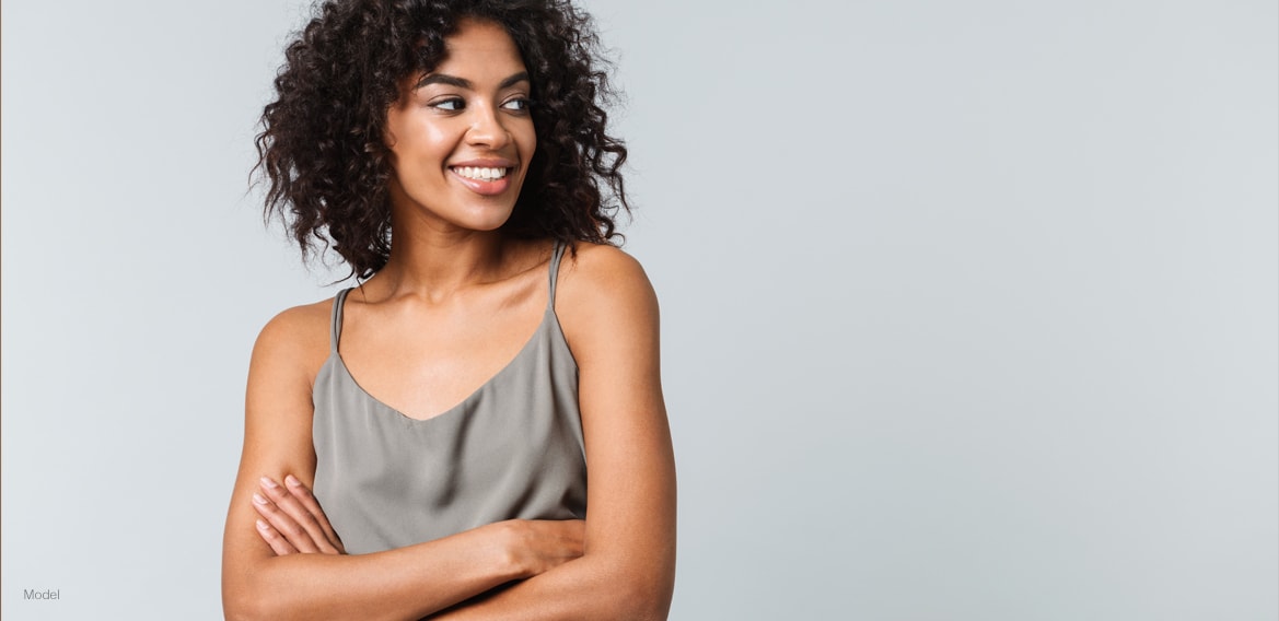 Beautiful woman wearing gray
