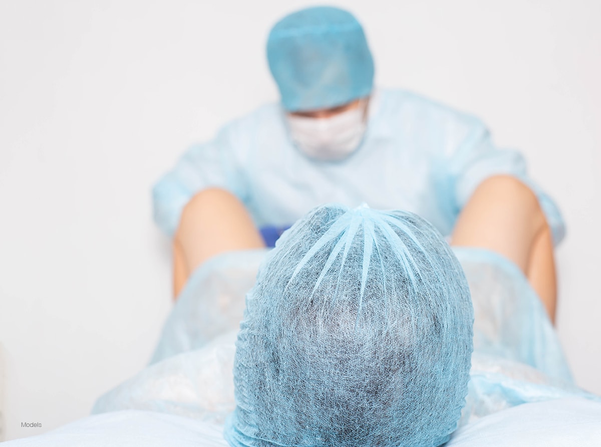 A woman at her surgical consultation for surgery.